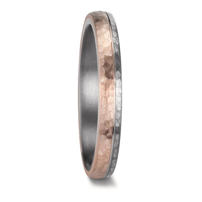 Elegant 3mm tantalum and rose gold wedding ring with a unique hammered and brushed finish. The design features two-thirds matte-finish 14K rose gold and one-third brushed tantalum, separated by a finely engraved line for a subtle yet sophisticated contrast.