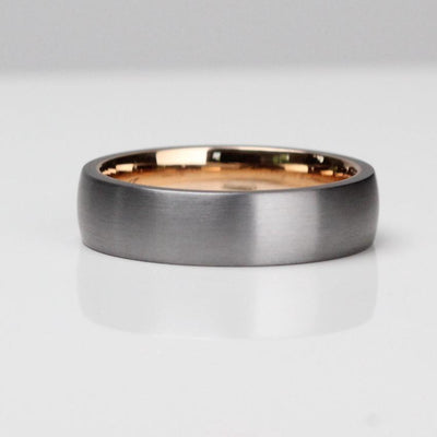 Tantalum wedding ring with a 14 karat yellow gold liner. Comfort fit mens wedding band