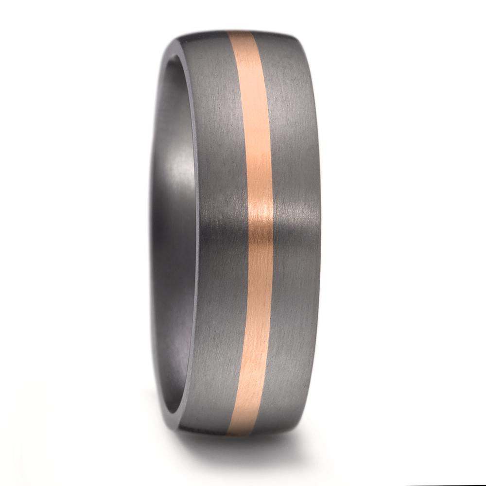 "Men's 7mm tantalum wedding ring with a comfort-fit design. The band features a sleek, central inlaid stripe of 14K rose gold, seamlessly fused with the tantalum for a smooth, modern finish that highlights the contrast between the two metals.