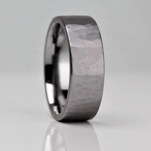 Hammered finish, Tantalum wedding ring. 7mm wide with a flat outside and comfort fit inside