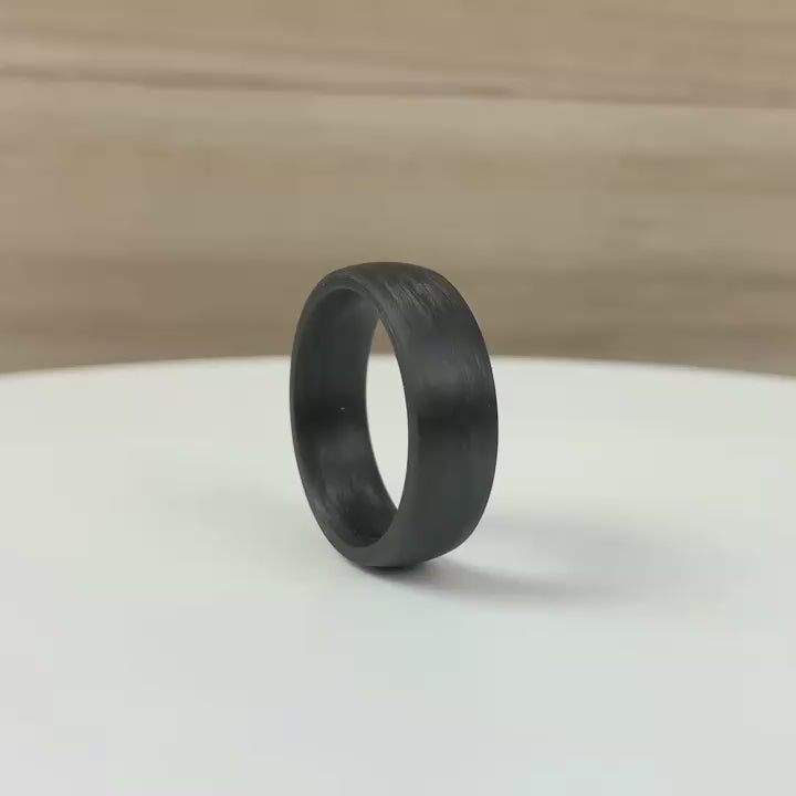 Black mans wedding ring ring band in carbon fibre. Court shape brushed 3mm 4mm