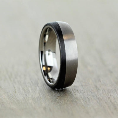 Titanium And Carbon fibre wedding ring band in a wave pattern. half black wedding band